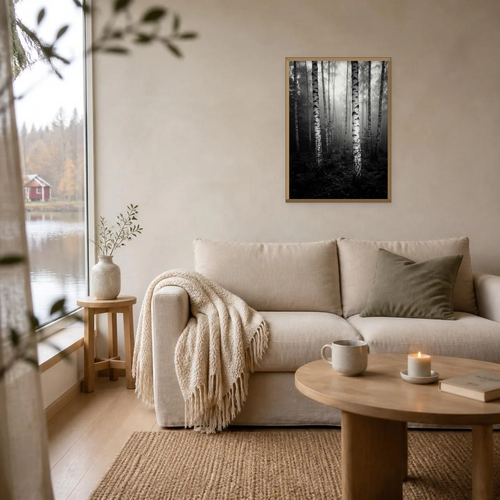 Birch Bark at Sunrise poster in a light oak frame above a linen sofa
