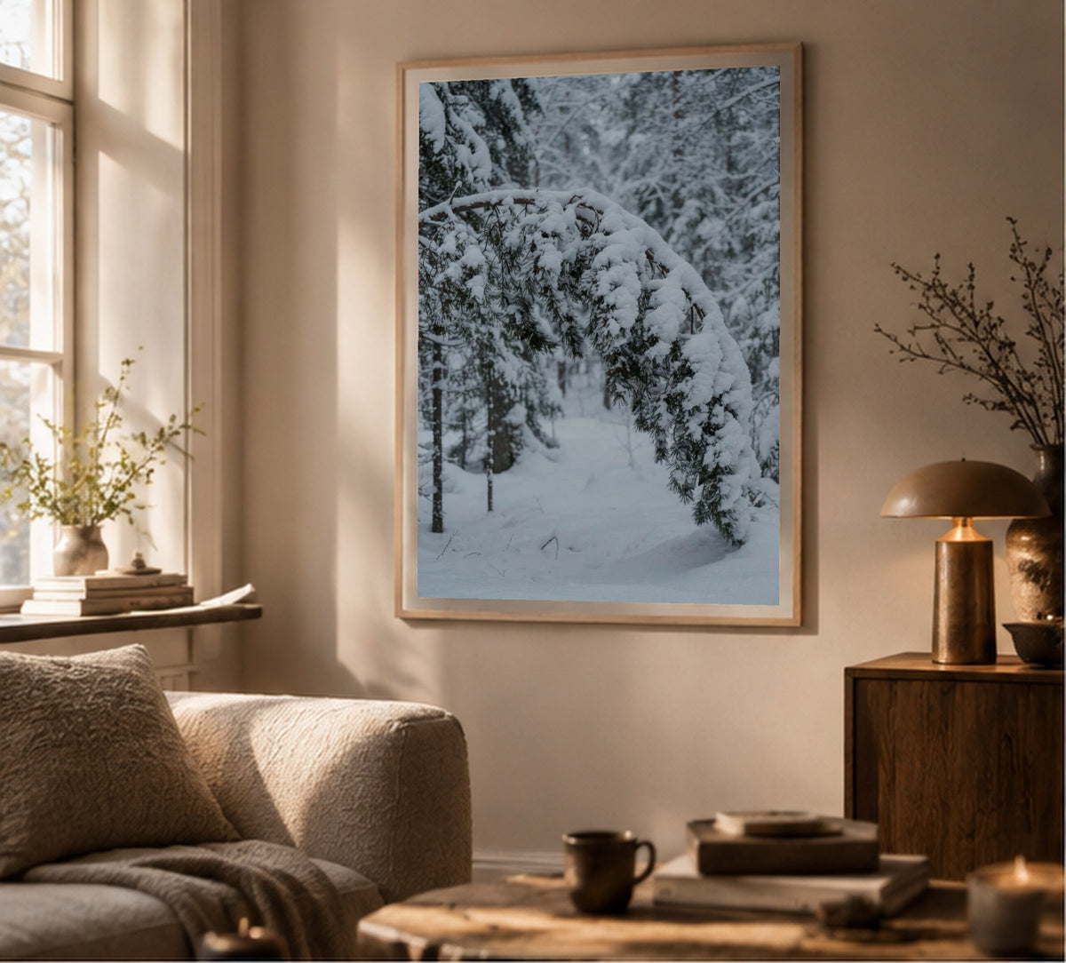 Snow-Laden Pine Branch art print, shown framed for inspiration in a sunlit living room