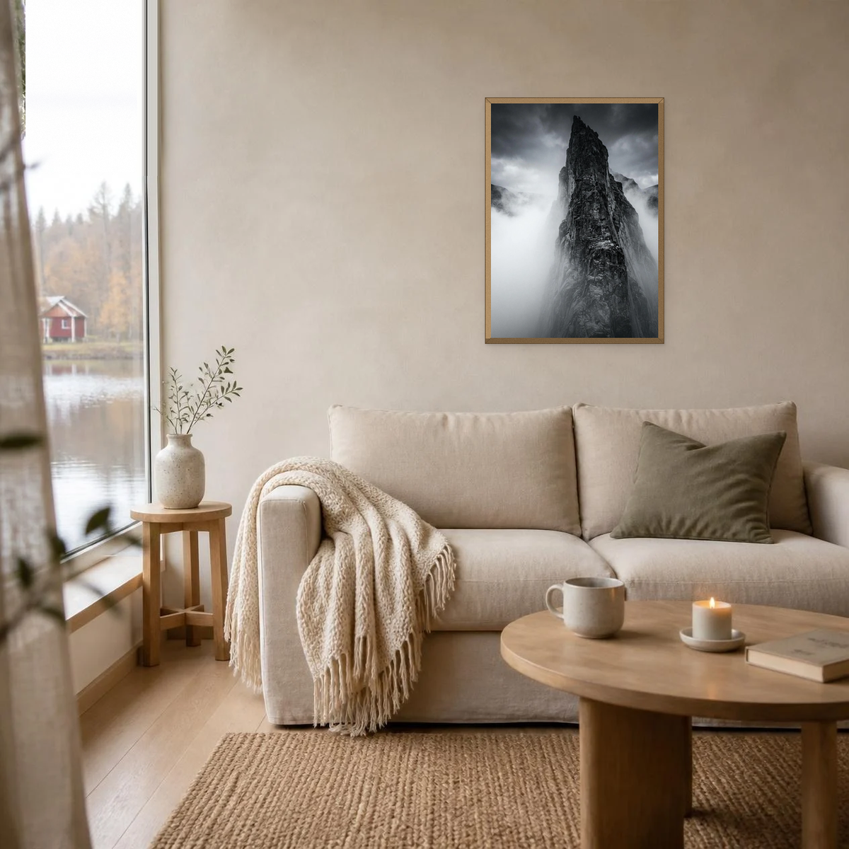 Rock Formation in the Mist poster in a light oak frame above a linen sofa