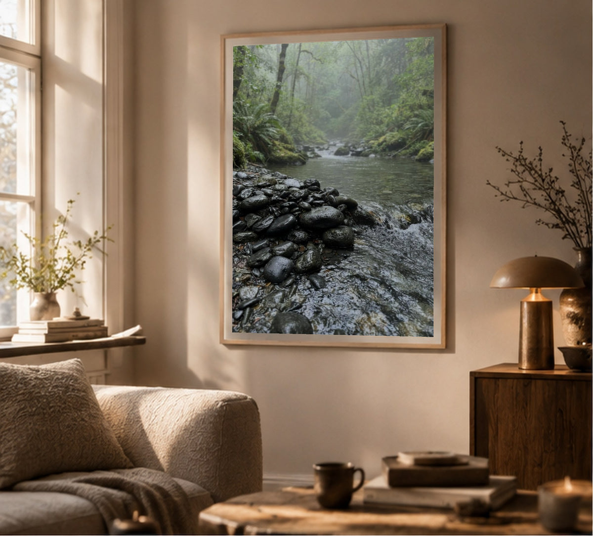 River Stones by the Stream art print, shown framed for inspiration in a sunlit living room