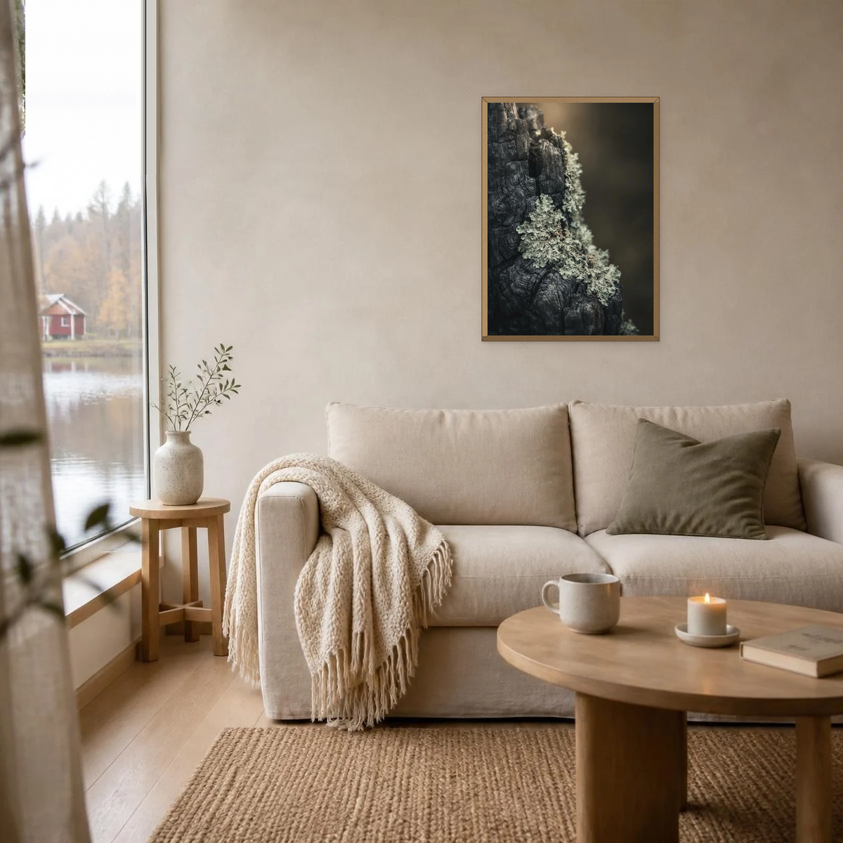 Charred Wood and Lichen poster in a light oak frame above a linen sofa