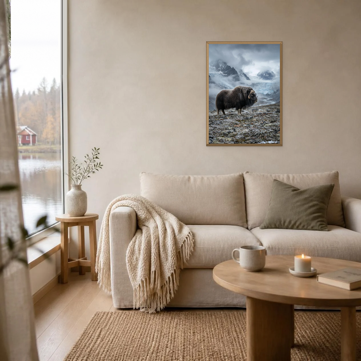Muskox in the Tundra poster in a light oak frame above a linen sofa