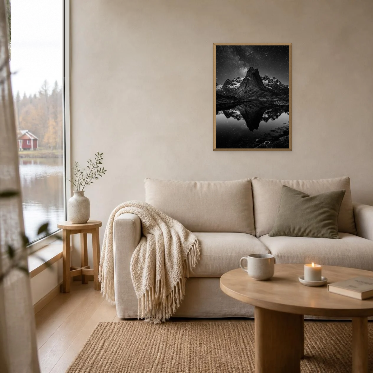 Peak Reflected in the Fjord poster in a light oak frame above a linen sofa