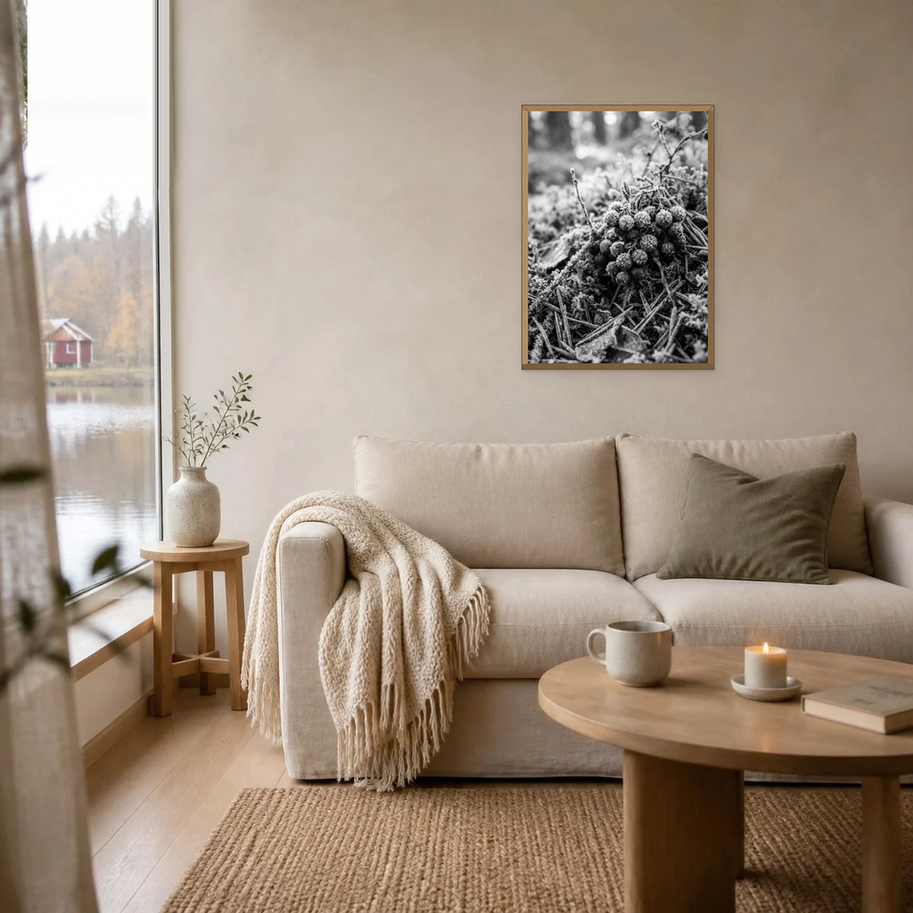 Frozen Lingonberries poster in a light oak frame above a linen sofa